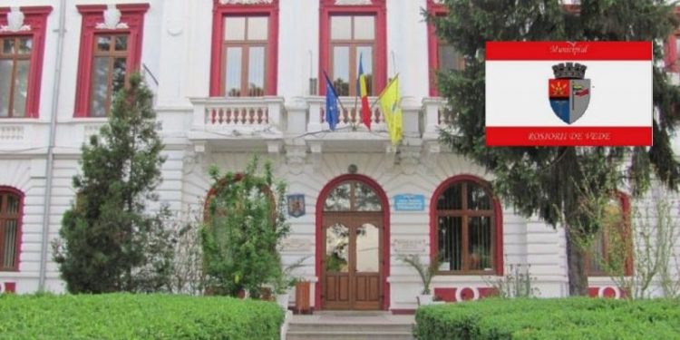 La Roșiorii de Vede se schimbă steagul pe primărie. Din galben se face alb-roșu